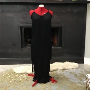 Slip style, lower calf length fringe dress